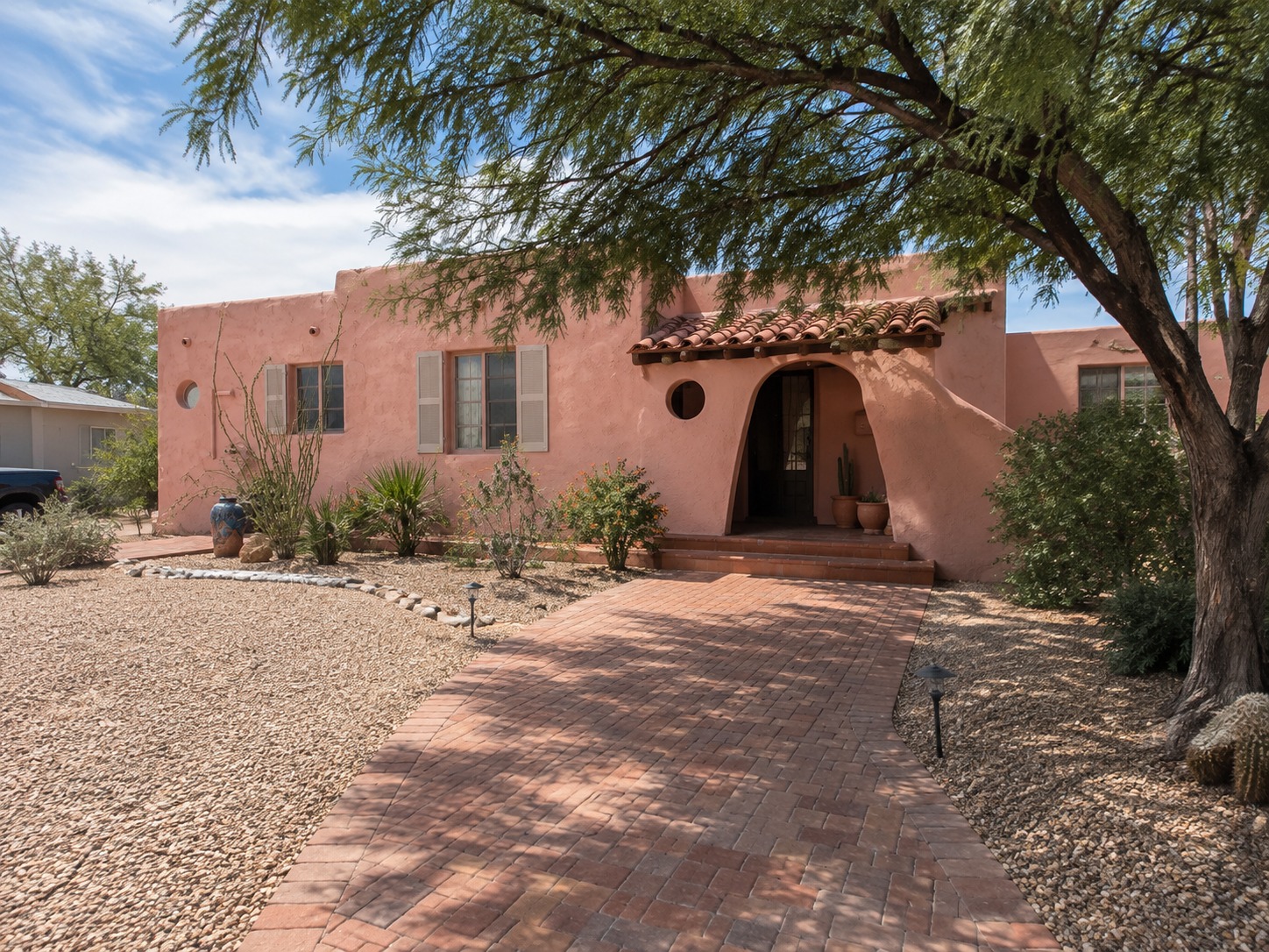 Mason tuck pointing a historic Tucson brick facade